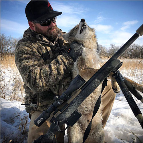 Steve Criner with coyote and Dog Soldier Predator Scope